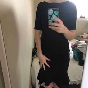 Textured body con ruffle dress